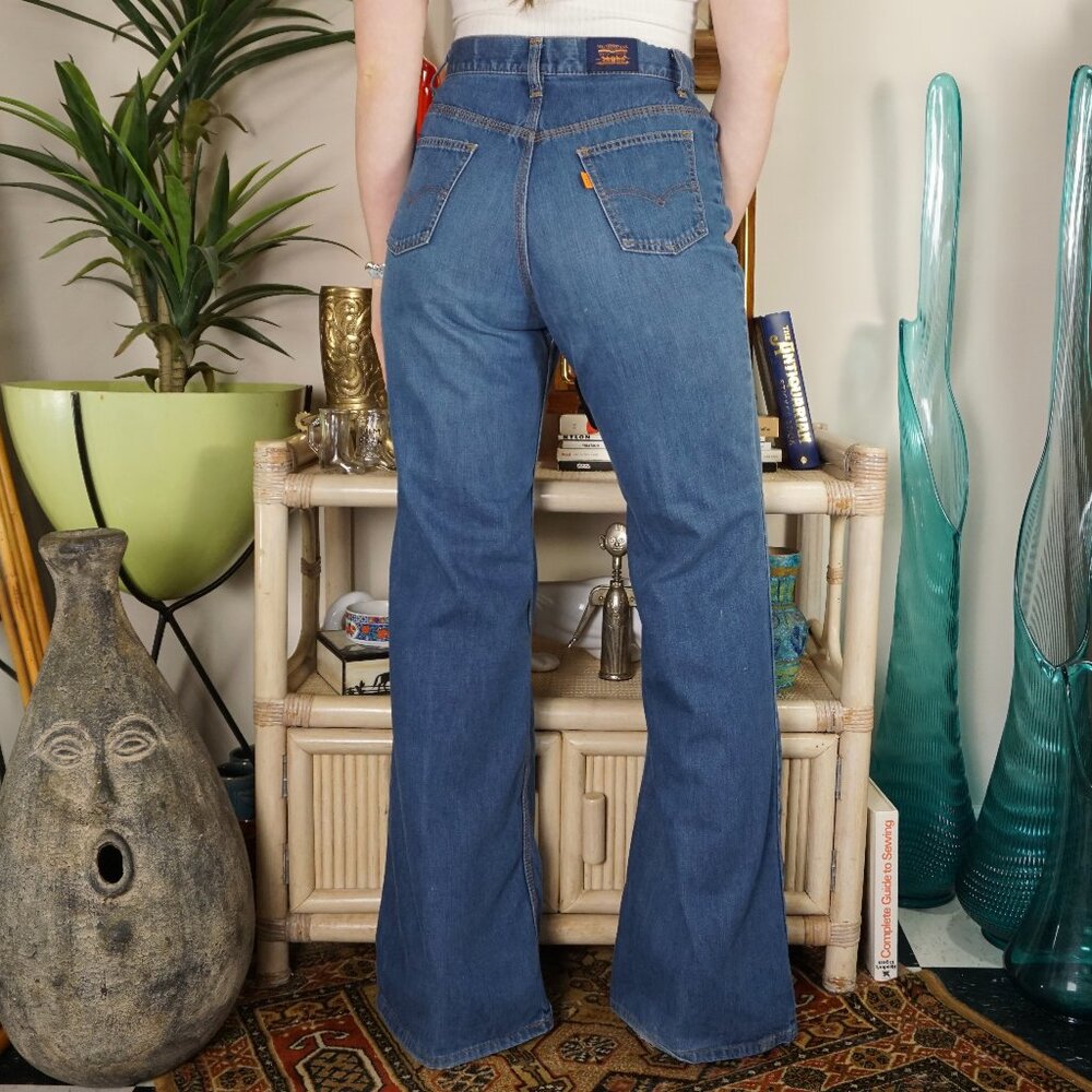 Vintage Levi's orange tab bell bottom wide leg high rise jeans